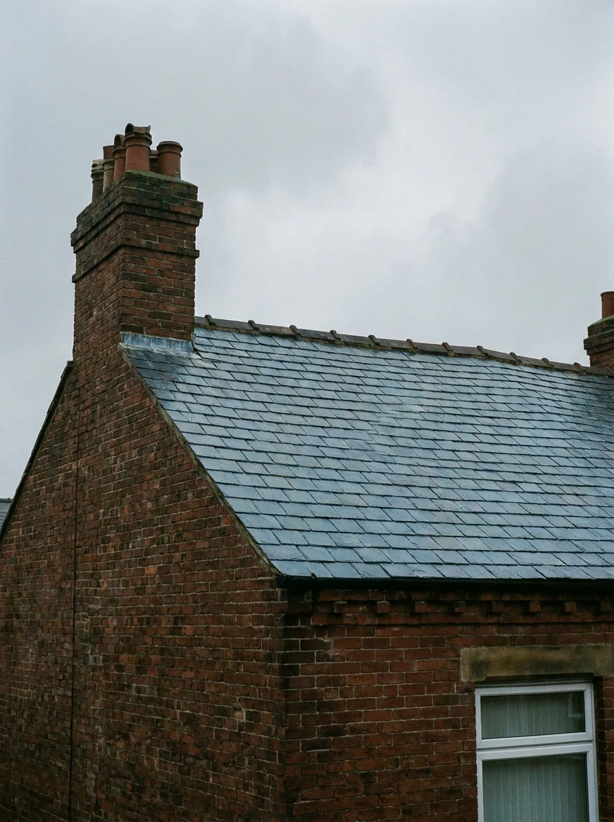 natural slate roof on a Victorian terrace, re-hooked and re-pointed